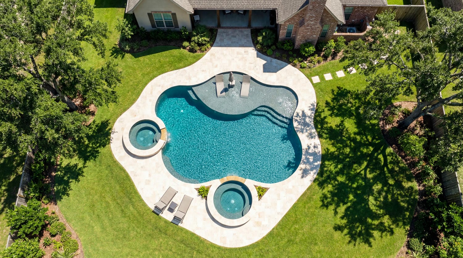 Custom freeform gunite pool, aerial view — Bocage, Baton Rouge