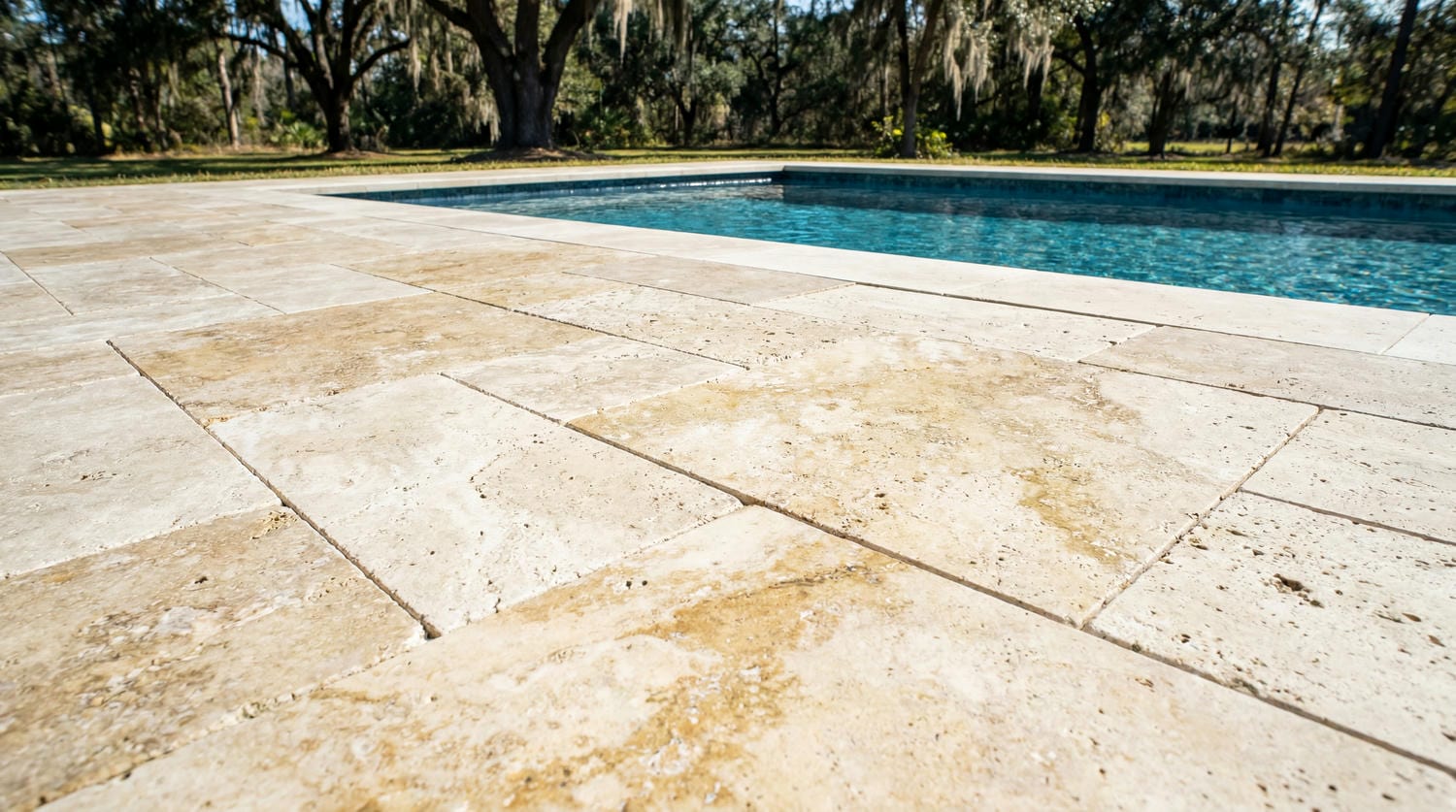 Tranquil swimming pool tucked beside an outdoor patio — Central, LA